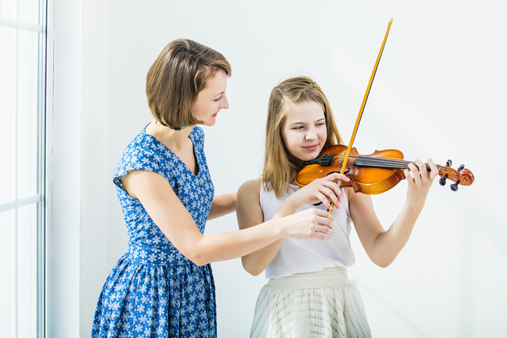 Child playing violin